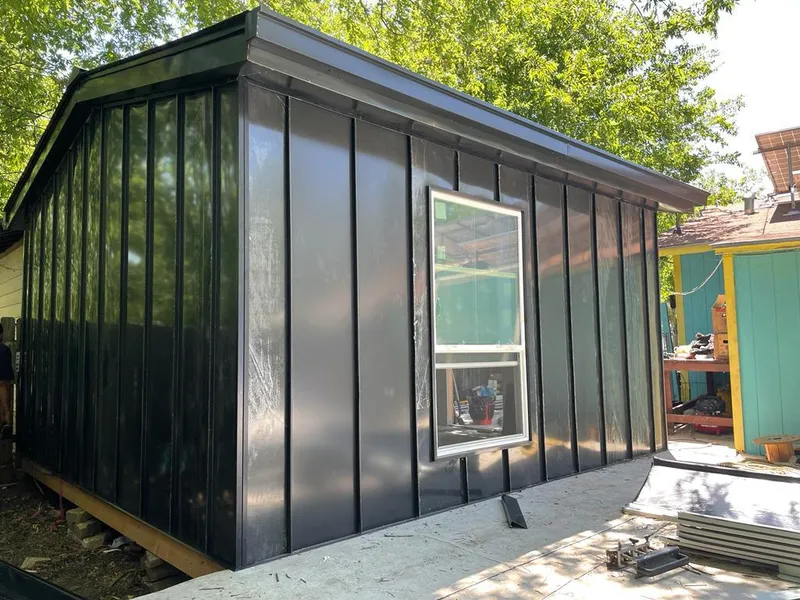 Black standing seam metal wall panels for Metal Roof Installation in Tallulah