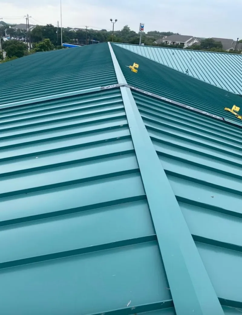 Green commercial metal roof ridge and valley for Metal Roof Repair in Tallulah